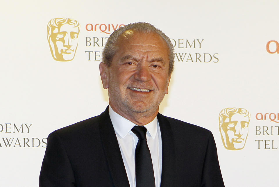 FILE - In this Sunday, May 27, 2012 file photo, British businessman Alan Sugar attends at the British Academy Television Awards in London. Former Tottenham chairman Alan Sugar says the Premier League is facing a “lot of problems” due to the coronavirus pandemic as they struggle to pay bills with the competition indefinitely suspended. Sugar tells on Friday, April 10, 2020 The Associated Press that “I fear for some clubs.” (AP Photo/Kirsty Wigglesworth, file)