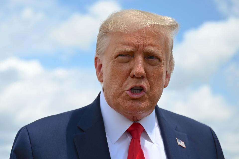 US President Donald Trump speaks to the press before boarding Air Force One at Joint Base Andrews in Maryland on August 6, 2020. - Trumps travels to Clyde, Ohio, to speak at a Whirlpool Corporation Manufacturing Plant. (Photo by JIM WATSON / AFP) (Photo by JIM WATSON/AFP via Getty Images)