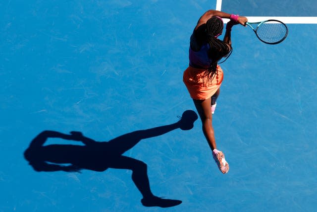 Coco Gauff leaps into a backhand during her defeat by Wang Qiang