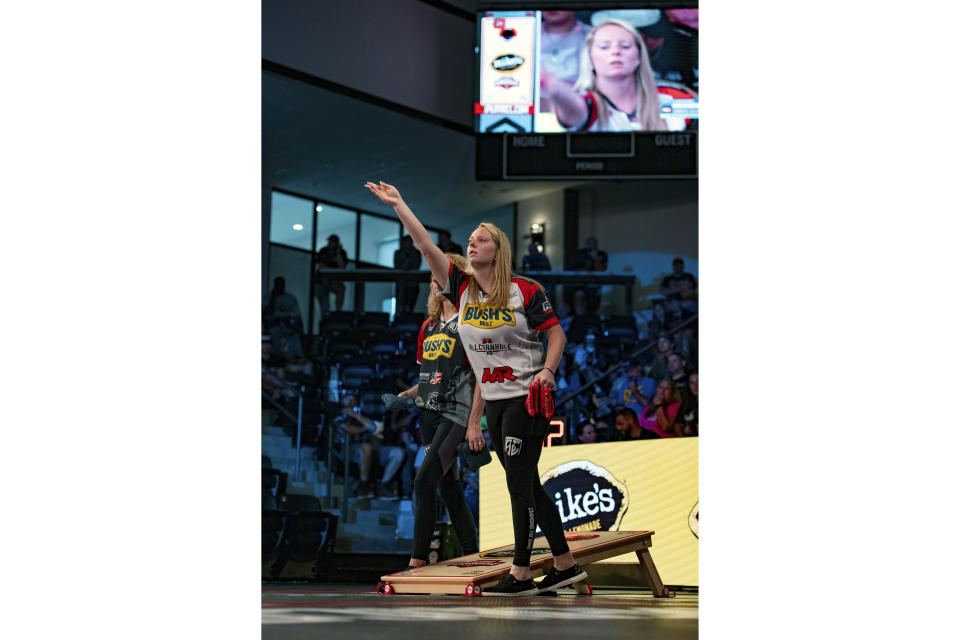 This Aug. 3, 2023, photo provided by the American Cornhole League shows Cheyenne Bubenheim competing in the ACL Women's Singles World Championship in Rock Hill, S.C. The recreational game of cornhole wouldn’t seem to have any characteristics that would give men an inherent advantage over women. Yet no woman ever has won a championship in the nine-year-old American Cornhole League’s gender-neutral pro singles division. Cheyenne Bubenheim wants to change that.(Haleigh Shedd/American Cornhole League via AP)