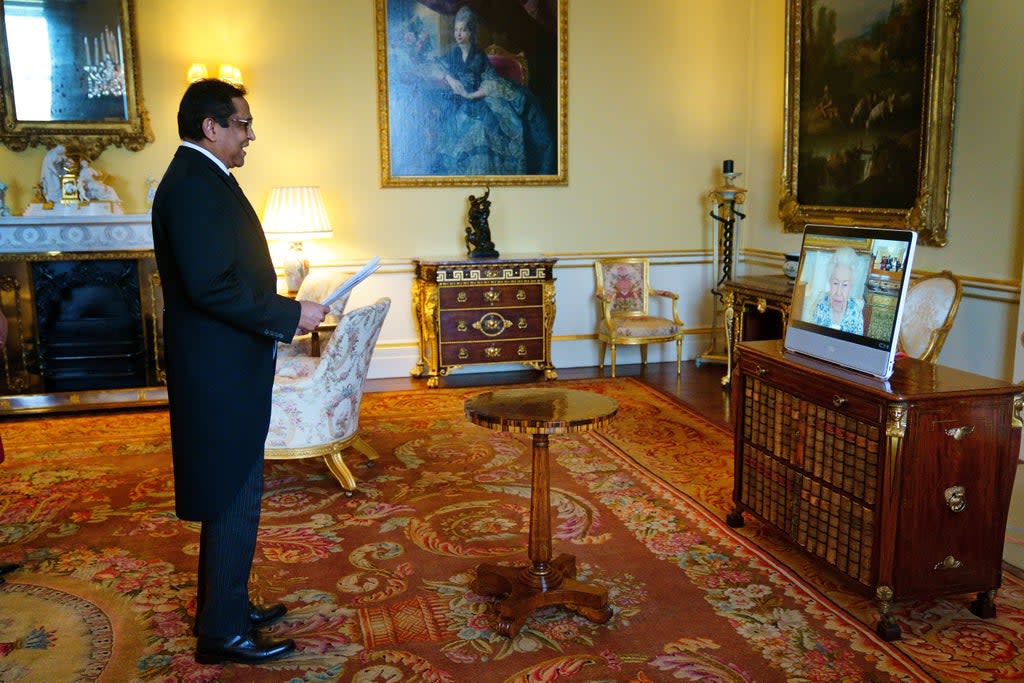 The Queen appears on a screen via video link from Windsor Castle, where she is in residence, during a virtual audience to receive the High Commissioner of Trinidad and Tobago, Vishnu Dhanpaul, at Buckingham Palace (PA) (PA Wire)