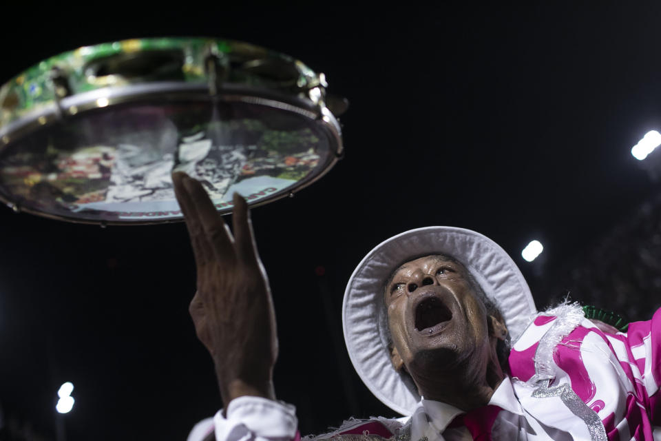 A performer from the Mangueira samba school parades during Carnival celebrations at the Sambadrome in Rio de Janeiro, Brazil, Monday, Feb. 20, 2023. (AP Photo/Bruna Prado)