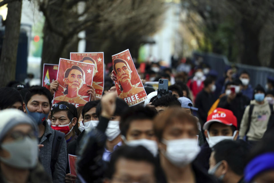 Burmese living in Japan and supporters march during a protest in front of the Foreign Ministry in Tokyo Wednesday, Feb. 3, 2021. Myanmar's new leader said the military government installed after Monday's coup plans an investigation into alleged fraud in last year's elections and will also prioritize the COVID-19 outbreak and the economy, a state newspaper reported Wednesday. (AP Photo/Eugene Hoshiko)