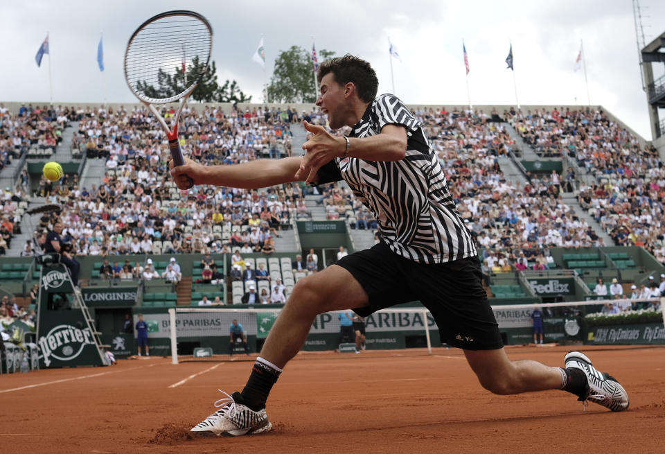 <p>Austria’s Dominic Thiem returns the ball to Germany’s Alexander Zverev during their third round match of the French Open tennis tournament at the Roland Garros stadium, May 28, 2016 in Paris. (AP Photo/Alastair Grant) </p>