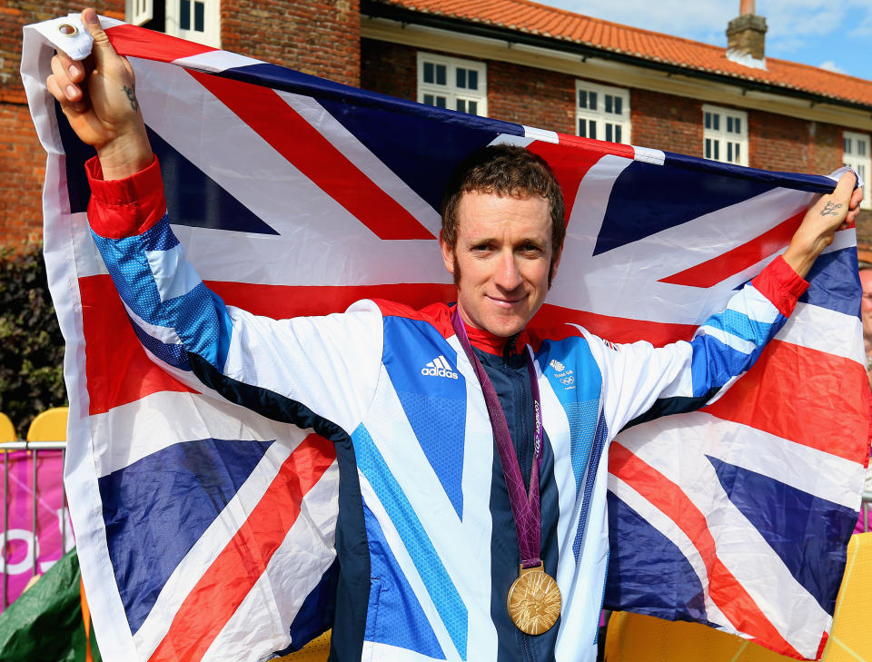 LONDON, ENGLAND - AUGUST 01: Gold medallist Bradley Wiggins of Great Britain celebrates after the victory ceremony after the Men's Individual Time Trial Road Cycling on day 5 of the London 2012 Olympic Games on August 1, 2012 in London, England. (Photo by Alex Livesey/Getty Images)
