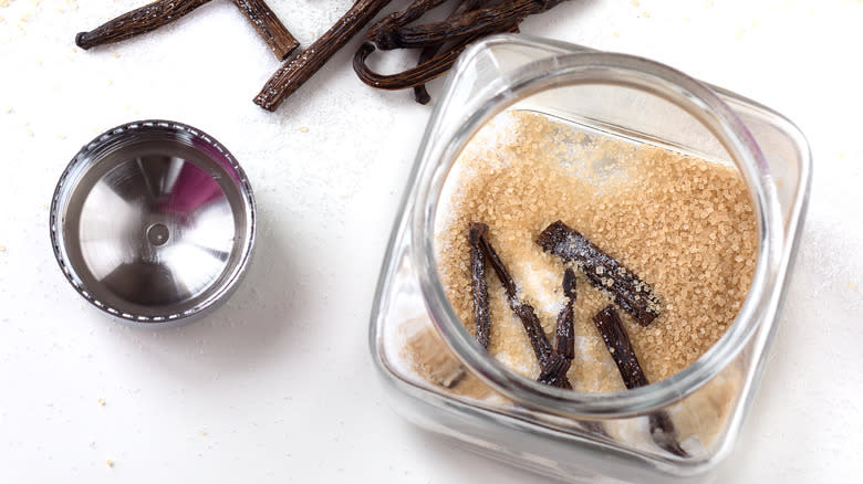 vanilla beans in sugar jar