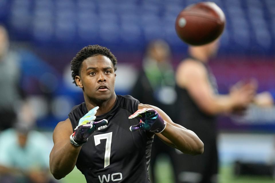 Penn State wide receiver Jahan Dotson runs a drill during the NFL football scouting combine, Thursday, March 3, 2022, in Indianapolis. (AP Photo/Darron Cummings)