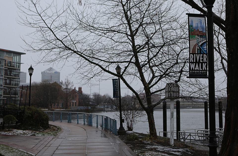 Light snow falls at the Wilmington Riverfront on Tuesday February 13, 2024.