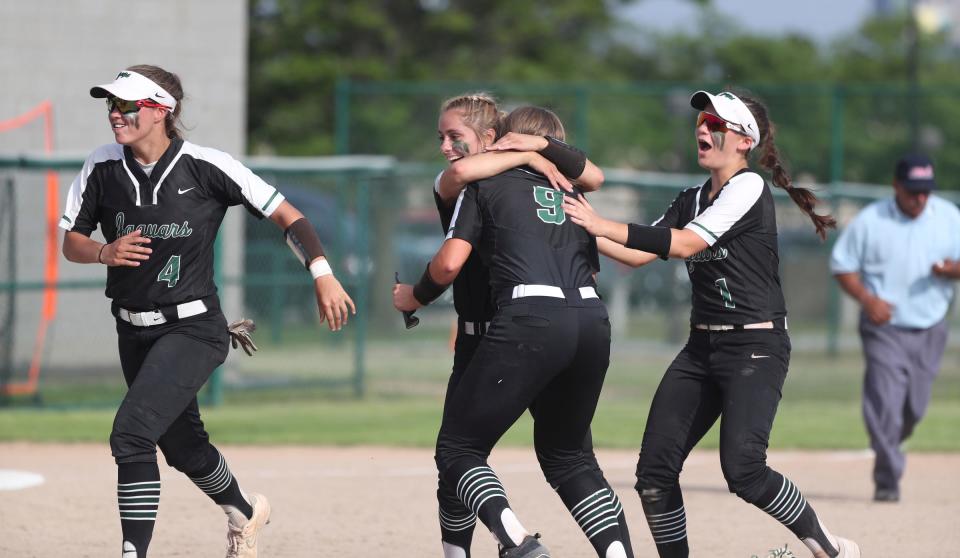 Allen Park celebrates the 11-3 win in the Division 1 quarterfinals at Wayne State on Tuesday, June 14, 2022.