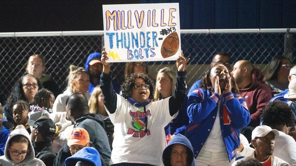 Millville fans cheer during the football game between Millville and Lenape played on the new turf field at the newly refurbished John Barbose Stadium at Wheaton Field in Millville on Friday, September 29, 2023.  Millville defeated Lenape, 26-3.