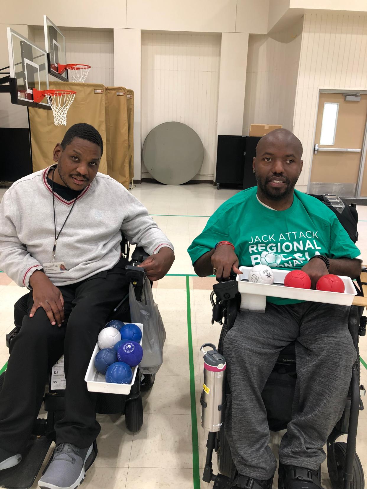 Marck Harrison, left, and Cornelius Oatis are raising funds to compete in the USA Boccia National Championships in August in Cedar Falls, Iowa. Their ultimate goal is the Paralympics in Los Angeles in 2028.