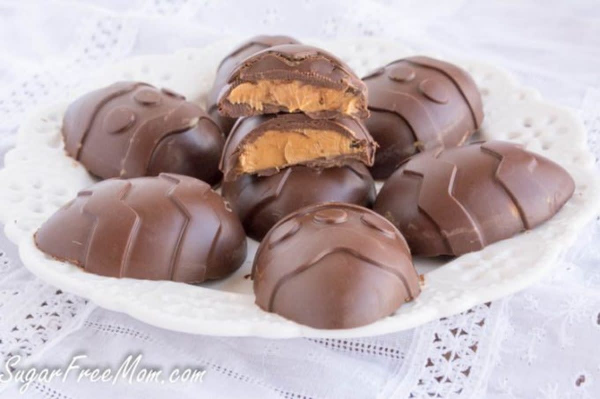 <p>Sugar Free Mom</p><p>Sugar-Free Chocolate Peanut Butter Easter Eggs are an easy no-bake recipe that’s keto, low-carb, gluten- and dairy-free! Most fabulous peanut butter Easter treat ever!</p><p><a href="https://www.sugarfreemom.com/recipes/sugar-free-chocolate-peanut-butter-easter-eggs-dairy-free/" rel="nofollow noopener" target="_blank" data-ylk="slk:Get the recipe!;elm:context_link;itc:0;sec:content-canvas" class="link rapid-noclick-resp">Get the recipe!</a></p>