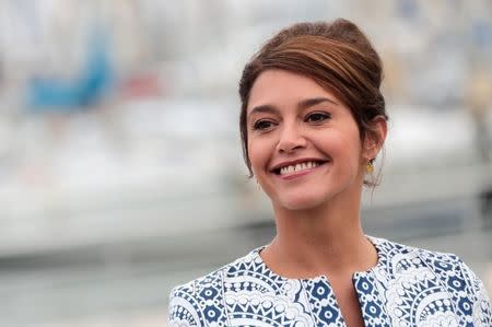 Actress Emma de Caunes poses during a photocall for the television series "Ransom" during the annual MIPCOM television programme market in Cannes, France, October 17, 2016. REUTERS/Eric Gaillard