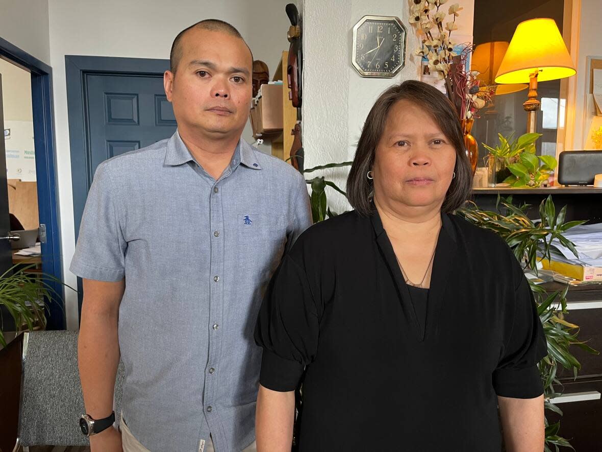 Emmanuel and Gilda Macarine still want answers about the 2021 death of their mother, Candida Macarine, at Lakeshore General Hospital. They say the independent report released last week is more focused on auditing the hospital’s management than improving patient care.   (Paula Dayan-Perez/CBC - image credit)