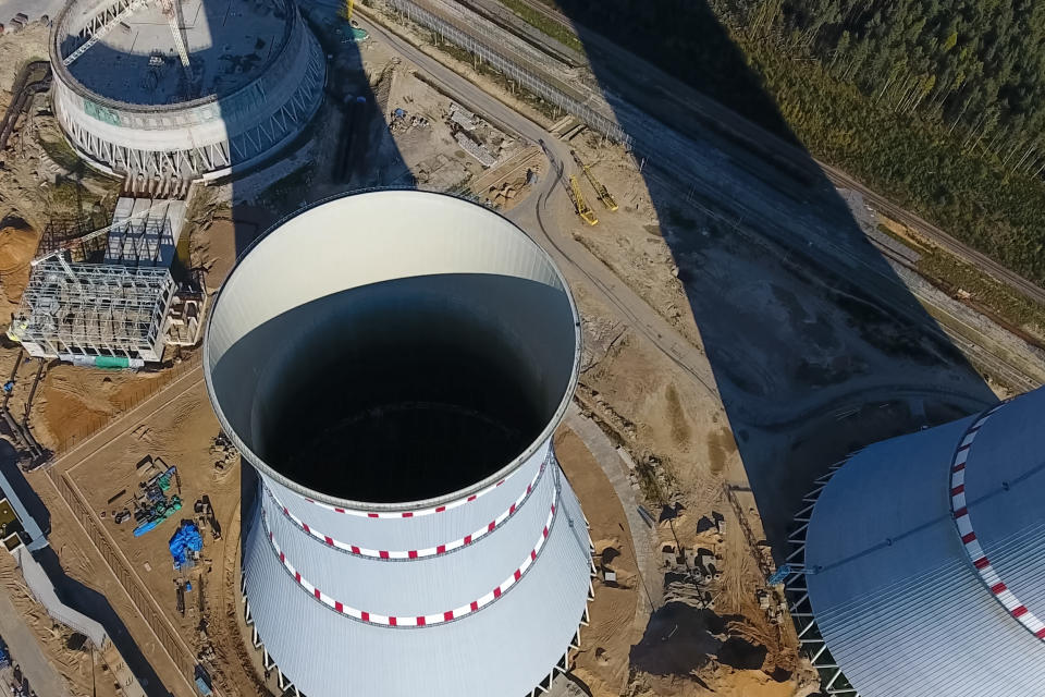 Aerial survey of a nuclear power plant under construction. Installation and construction of a power plant. Nuclear power.