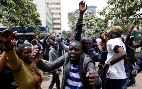 Celebrations in downtown Nairobi after a re-election is called - Credit: BAZ RATNER/Reuters