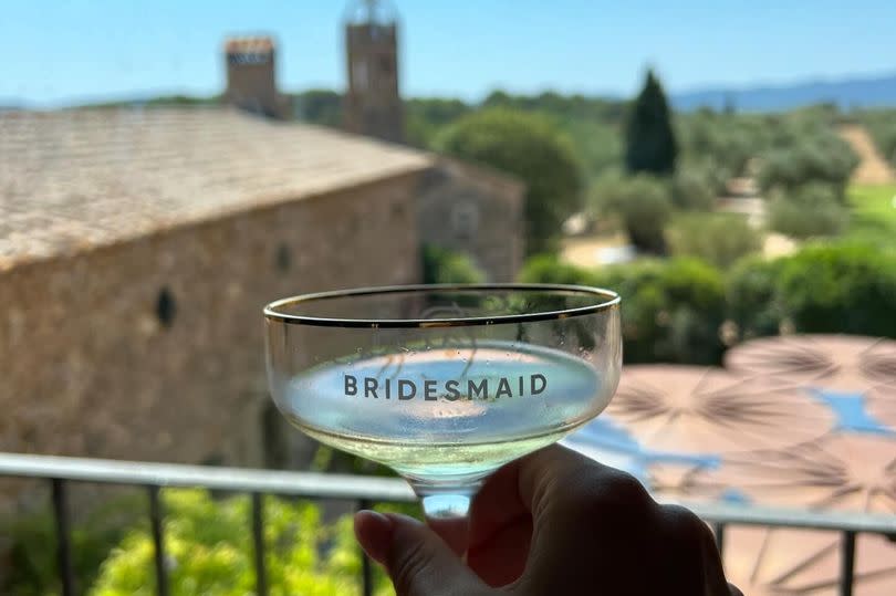 Tasha Ghouri holding bridesmaid glass