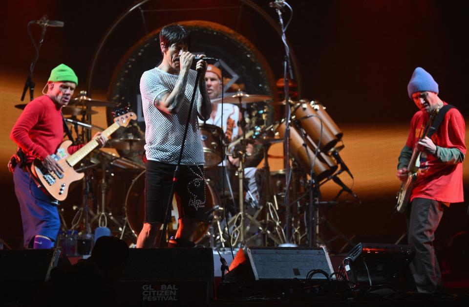 (From L) Red Hot Chili Peppers' members Flea, Anthony Kiedis, Chad Smith, and John Frusciante perform during the Global Citizen Festival at Central Park in New York City on September 23, 2023.