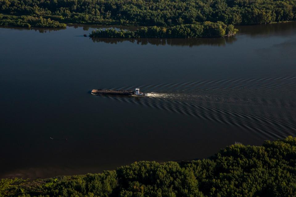 A barge travels on the Mississippi River near the Quad Cities of Iowa and Illinois on Sept. 18. Aerial support provided by LightHawk.