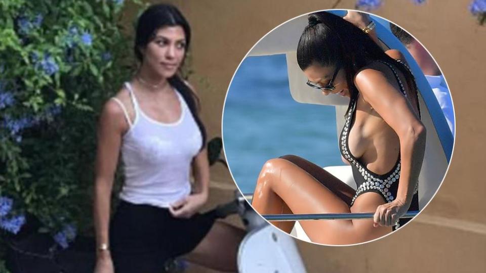 Kourtney flashes some boob...Again!