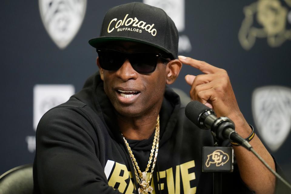 Colorado head football coach Deion Sanders responds to questions during a press conference on Friday.