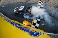 TALLADEGA, AL - MAY 05: Joey Logano, driver of the #18 GameStop Toyota, perfoms a burnout to celebrate after winning the NASCAR Nationwide Series Aaron's 312 at Talladega Superspeedway on May 5, 2012 in Talladega, Alabama. (Photo by Jared C. Tilton/Getty Images)