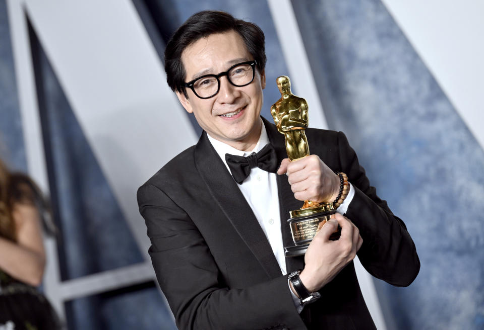 Ke Huy Quan, winner of the best supporting actor award, arrives at the Vanity Fair Oscar Party on Sunday, March 12, 2023, at the Wallis Annenberg Center for the Performing Arts in Beverly Hills, Calif. (Photo by Evan Agostini/Invision/AP)