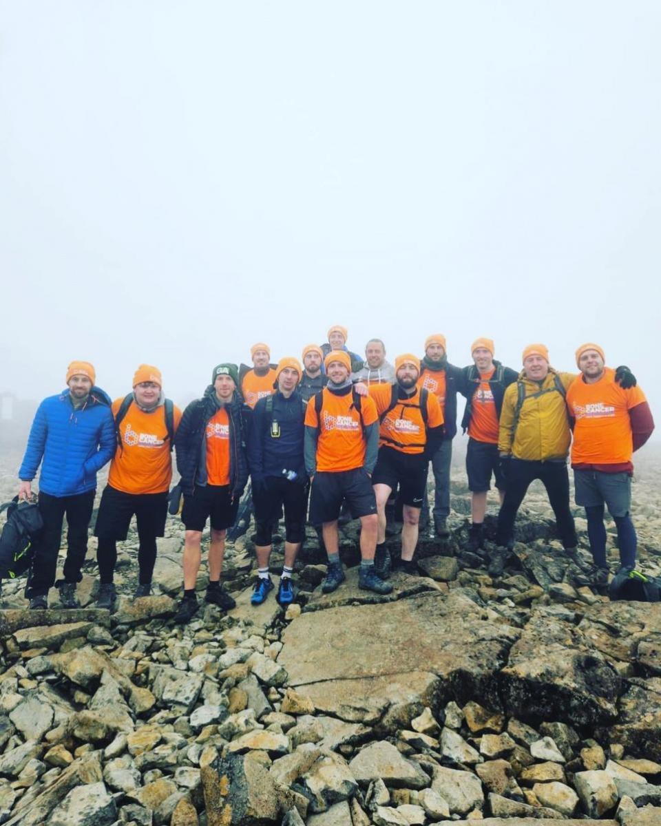 Lancashire Telegraph: The pals at the summit of one of the mountains