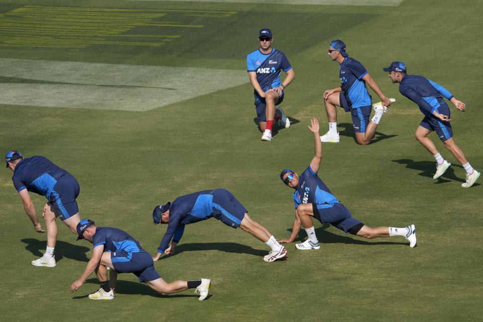 New Zealand's players warm up during a training session, in Karachi, Pakistan, Friday, Dec. 23, 2022. (AP Photo/Fareed Khan)