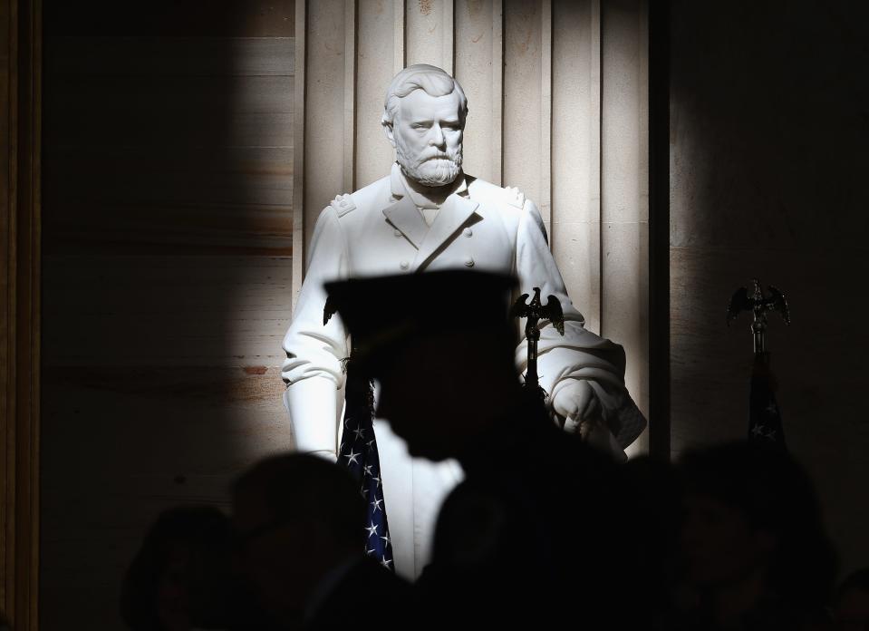 A patch of light hits the statue of the 18th U.S. President Ulysses S. Grant during a Congressional Gold Medal ceremony at the U.S. Capitol, June 26, 2014 in Washington, DC.