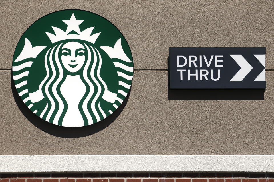 A Starbucks Drive Thru logo is pictured on a building in Buffalo, New York April 14, 2016. REUTERS/Carlo Allegri