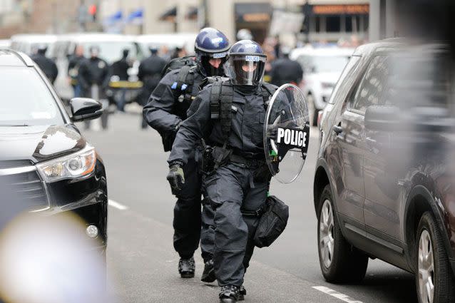 Riot police make their way toward the protesters. Source: AP