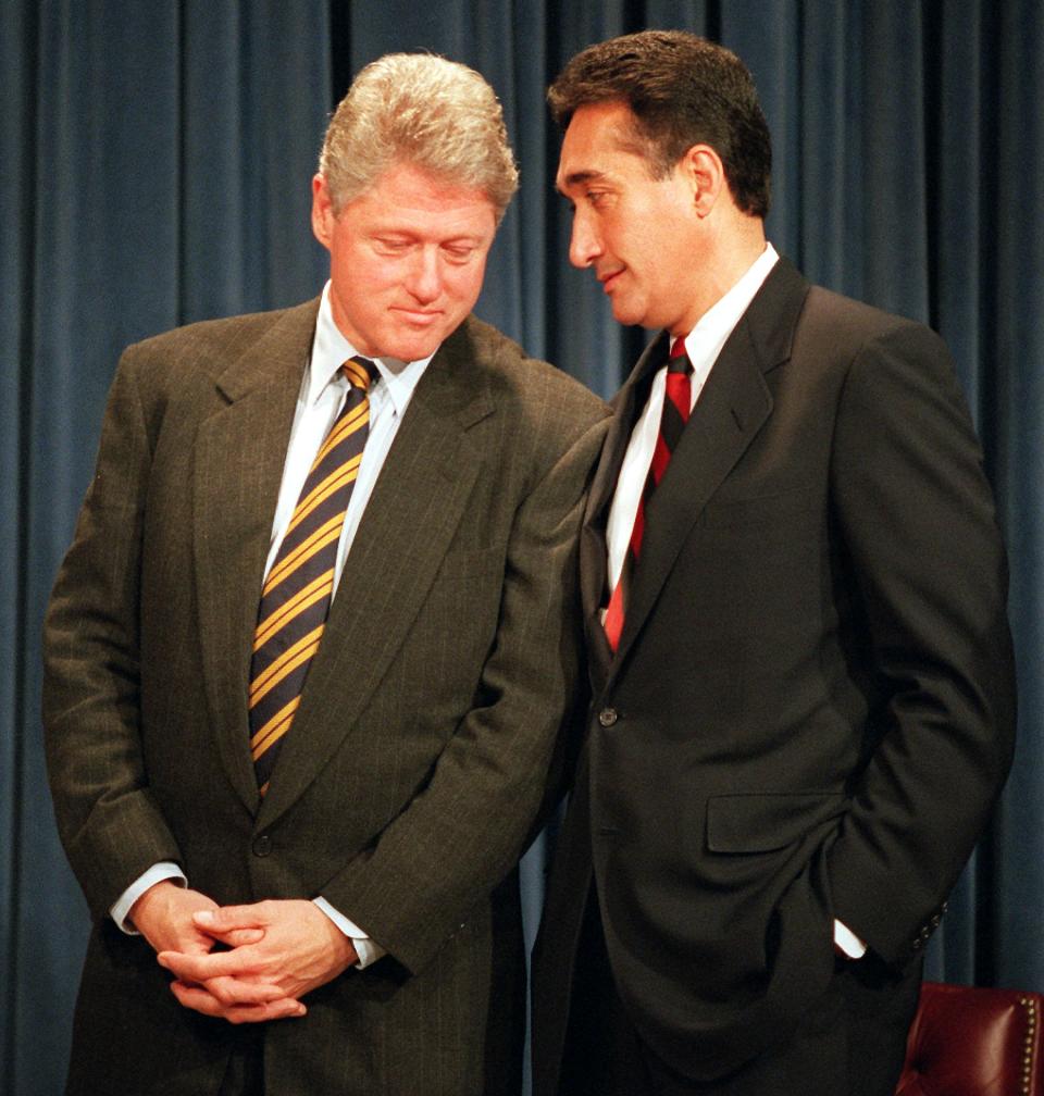 President Clinton listens to Housing Secretary Henry Cisneros in the Old Executive Building in Washington Dec. 19, 1994. Cisneros was charged Thursday, Dec. 11, 1997, in an 18-count indictment with conspiracy, obstructing justice and making false statements to the FBI about payments to his former mistress, Linda Jones. Cisneros is the second former member of President Clinton's Cabinet to be indicted on felony charges.(AP Photo/J. Scott Applewhite)