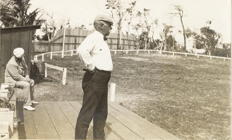 From a shooting platform, an unidentified man surveys the Florida Gun Club grounds.
