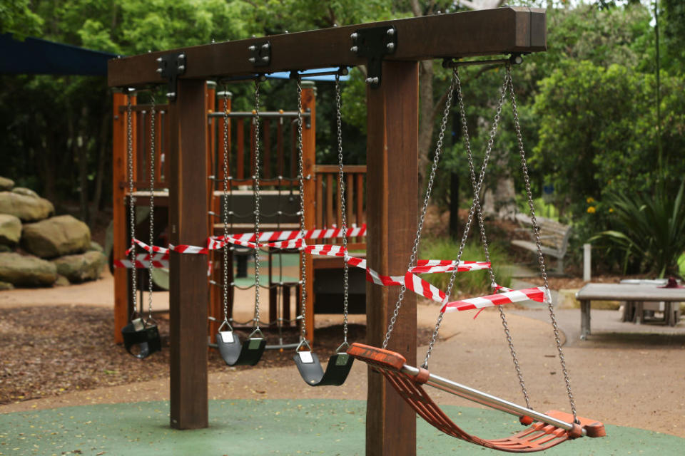 Hazard tape is seen on outdoor playground equipment at Hallstrom Park, Willoughby in Sydney.