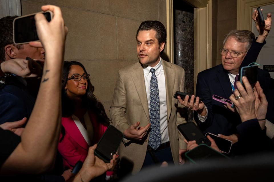 Matt Gaetz and Lauren Boebert speak to reporters after confronting House Speaker Mike Johnson over passage of military assistance to Ukraine on 18 April (Getty Images)