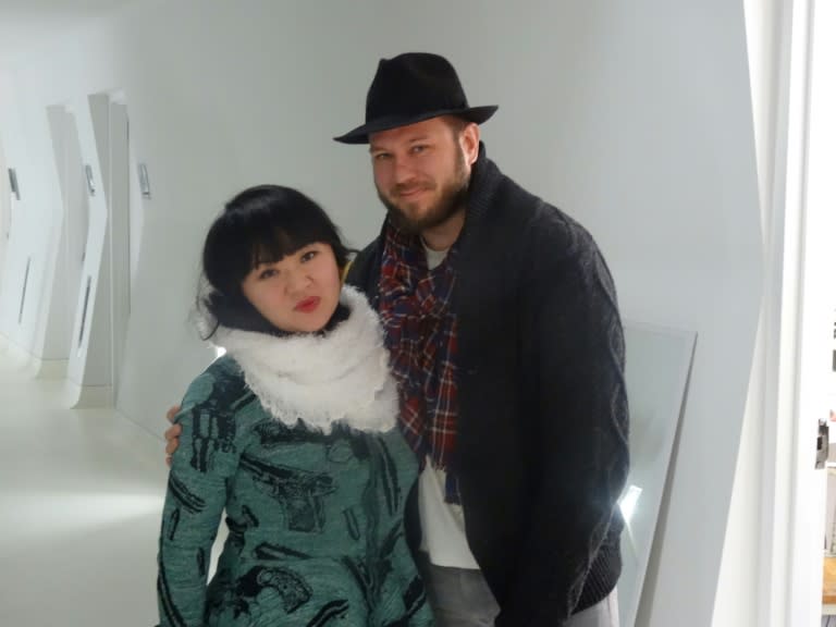 Composer Du Yun, left, and librettist Royce Vavrek appear after the dress rehearsal of their opera "Angel's Bone" at the 3LD Art and Technology Center in New York on January 5, 2016