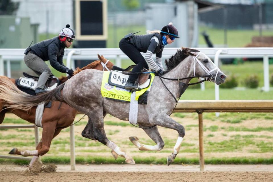 Tapit Trice, with jockey Amelia Green aboard, goes for a run during a morning workout at Churchill Downs on Saturday.