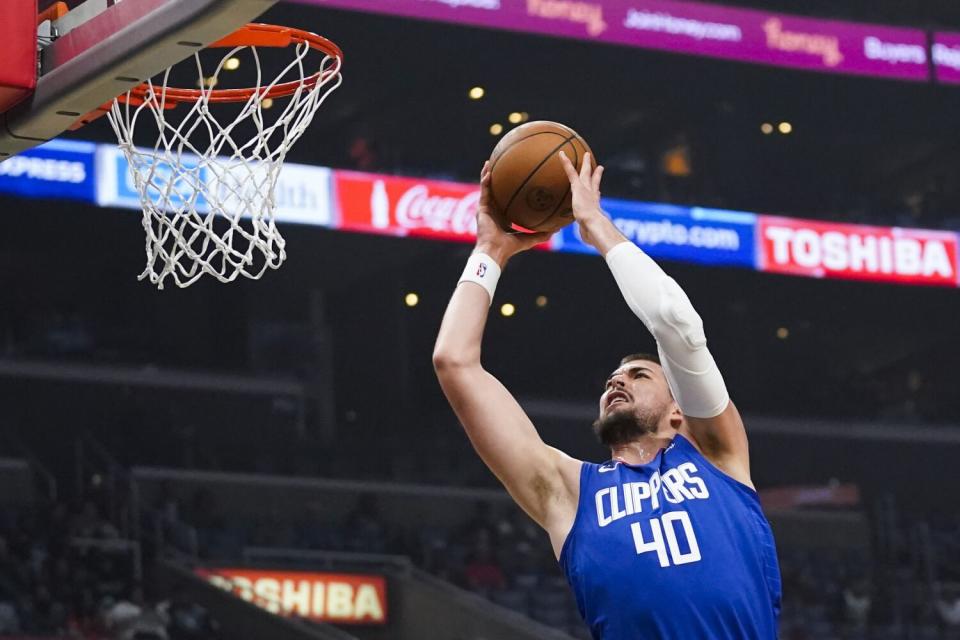 Clippers center Ivica Zubac takes a shot against the Houston Rockets on Monday at Crypto.com Arena.