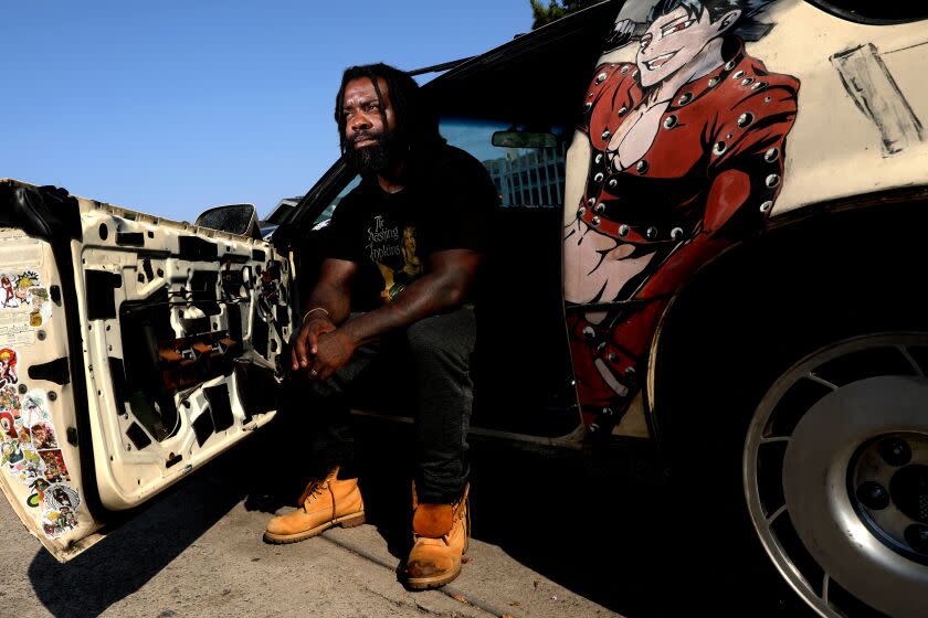 LOS ANGELES, CA - AUGUST 15: Bryant Mangum, 39, at his home on Sunday, Aug. 15, 2021 in Los Angeles, CA. Magnum says he's been racially profiled and pulled over without cause by LAPD many times. Once, they dragged him out of his car and arrested him for being double parked in front of his own house. Los Angeles Department of Transportation to study removing Los Angeles Police Department from traffic stops. (Gary Coronado / Los Angeles Times)