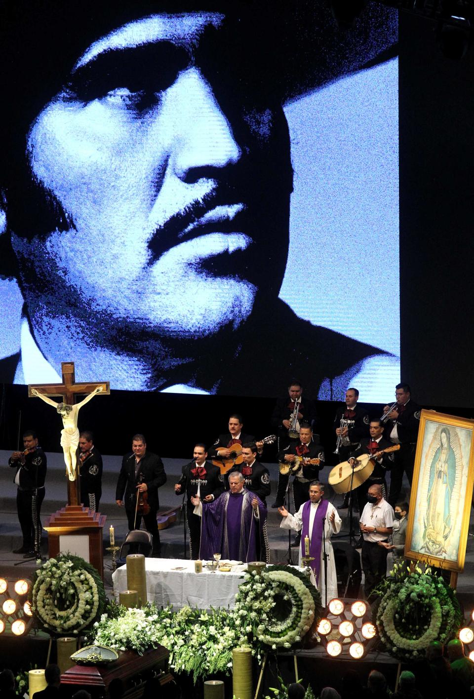 The coffin of Mexican singer Vicente Fernandez is displayed during his funeral at "Los Tres Potrillos" ranch in Tlajomulco de Zuñiga, Jalisco state, Mexico, on December 13, 2021.