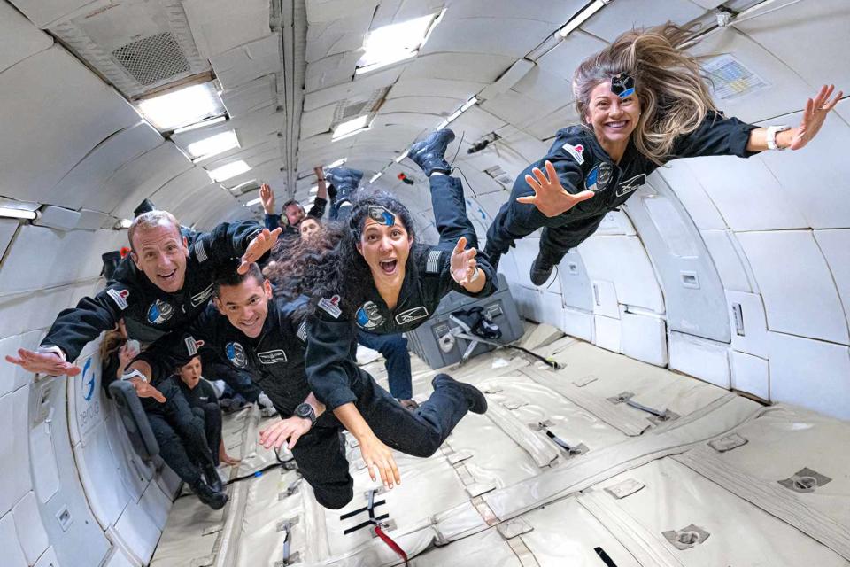 <p>Polaris Program / John Kraus</p> Anna Menon (right) and the Polaris Dawn crew on a zero-gravity research flight in 2022.