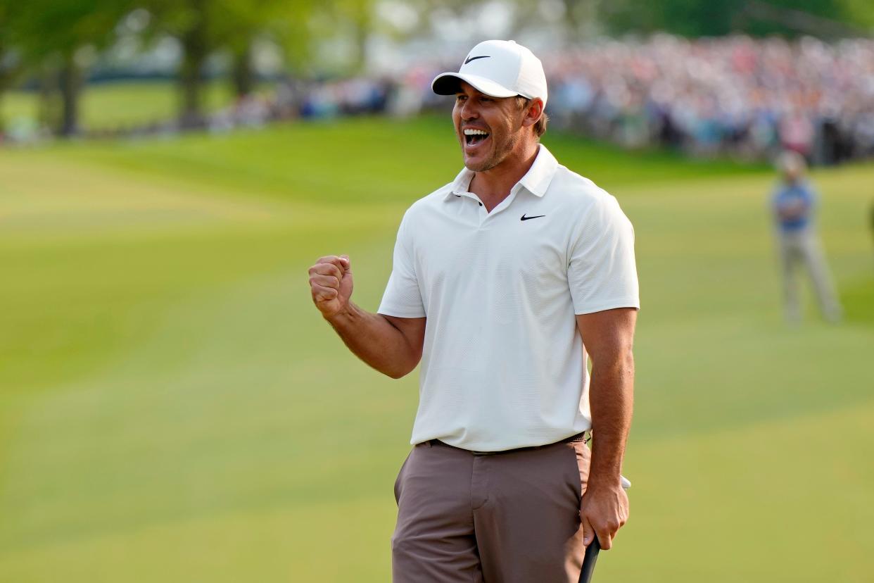 Brooks Koepka celebrates after winning the PGA Championship at Oak Hill Country Club in 2023.