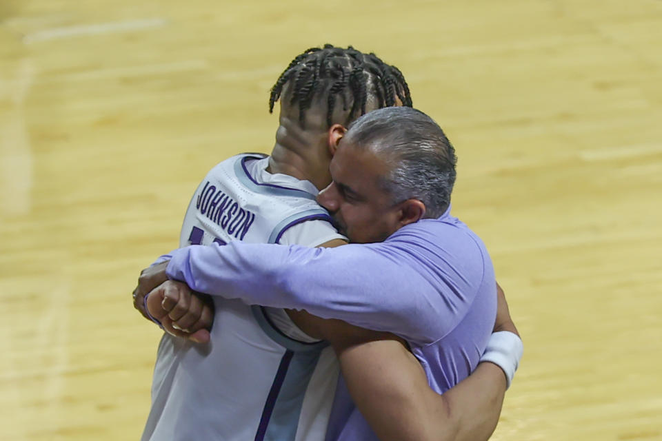 MANHATTAN, KS - MARCH 01: Kansas State Wildcats forward Keyontae Johnson (11) hugs head coach Jerome Tang as he leaves the game late in the second half of a Big 12 basketball game between the Oklahoma Sooners and Kansas State Wildcats on March 1, 2023 at Bramlage Coliseum in Manhattan, KS. (Photo by Scott Winters/Icon Sportswire via Getty Images)