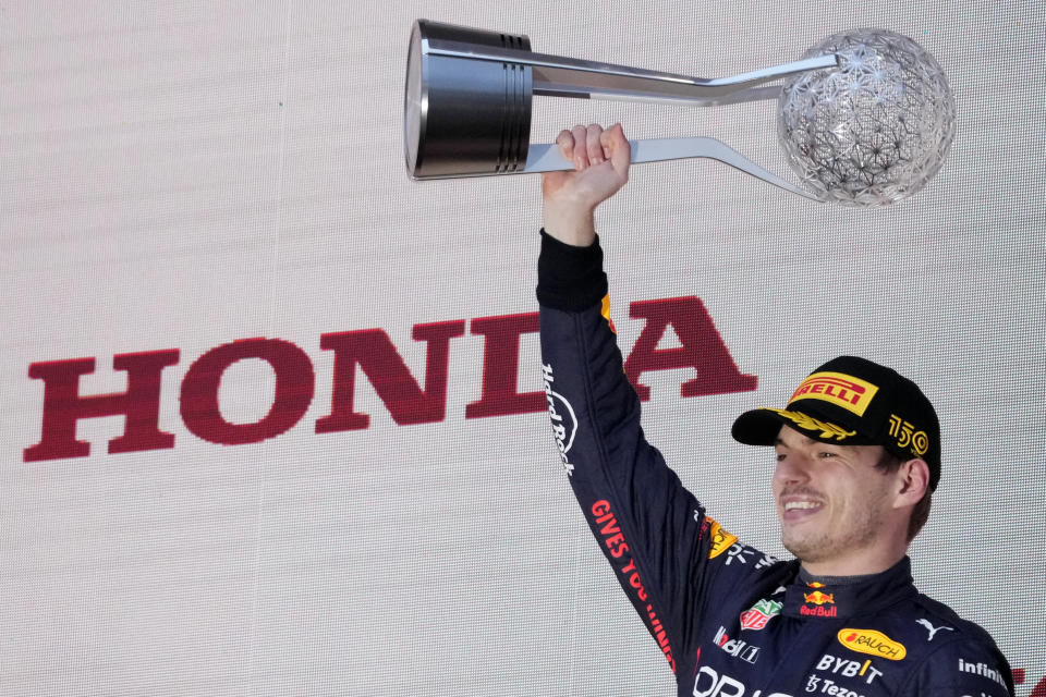 Red Bull driver Max Verstappen of the Netherlands celebrates his win during the Japanese Formula One Grand Prix at the Suzuka Circuit in Suzuka, central Japan, Sunday, Oct. 9, 2022. Verstappen secured second consecutive Formula One drivers' championship. (AP Photo/Eugene Hoshiko)