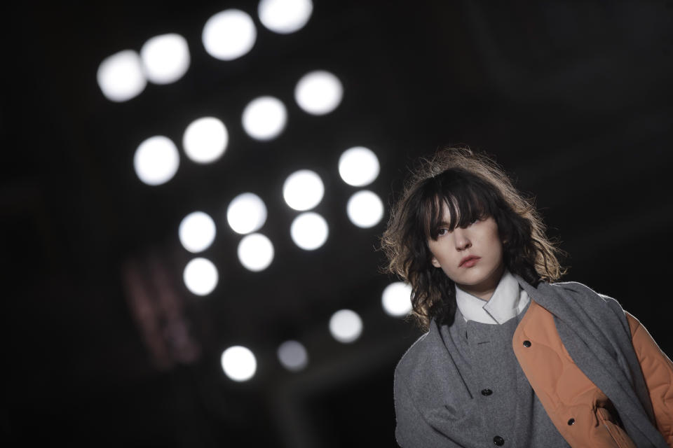 A model wears a creation part of the Ujoh women's Fall-Winter 2019-2020 collection, that was presented in Milan, Italy, Sunday, Feb.24, 2019. (AP Photo/Luca Bruno)