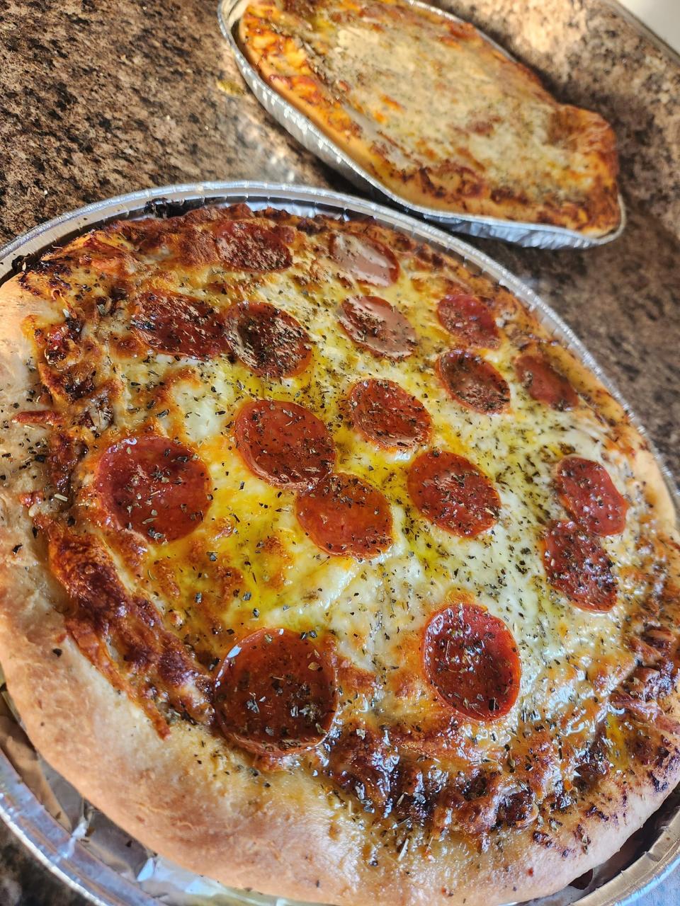 A practice pizza for Fat Kid Pizza, which is opening soon in the Empire Mall.