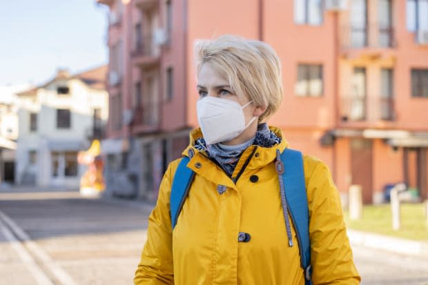 Portrait of a woman wearing protective face mask in accordance with the European health guidelines FFP2/KN95<p>iStock</p>