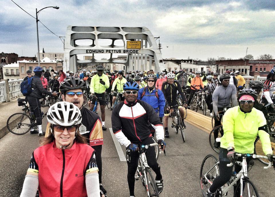 Cyclists ride on the Edmund Pettus Bridge in Selma, Ala., in 2015, during the 50th anniversary of the Selma-to-Montgomery civil rights march.