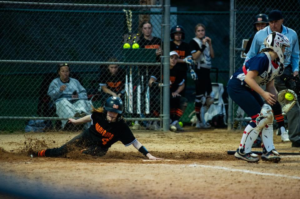 Marlboro's Lilly Sullivan slides across home plate against Pine Plains during the MHAL softball final on May 13, 2024.